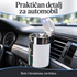 Bela auto pepeljara sa poklopcem postavljena uz ventilacioni otvor automobila.